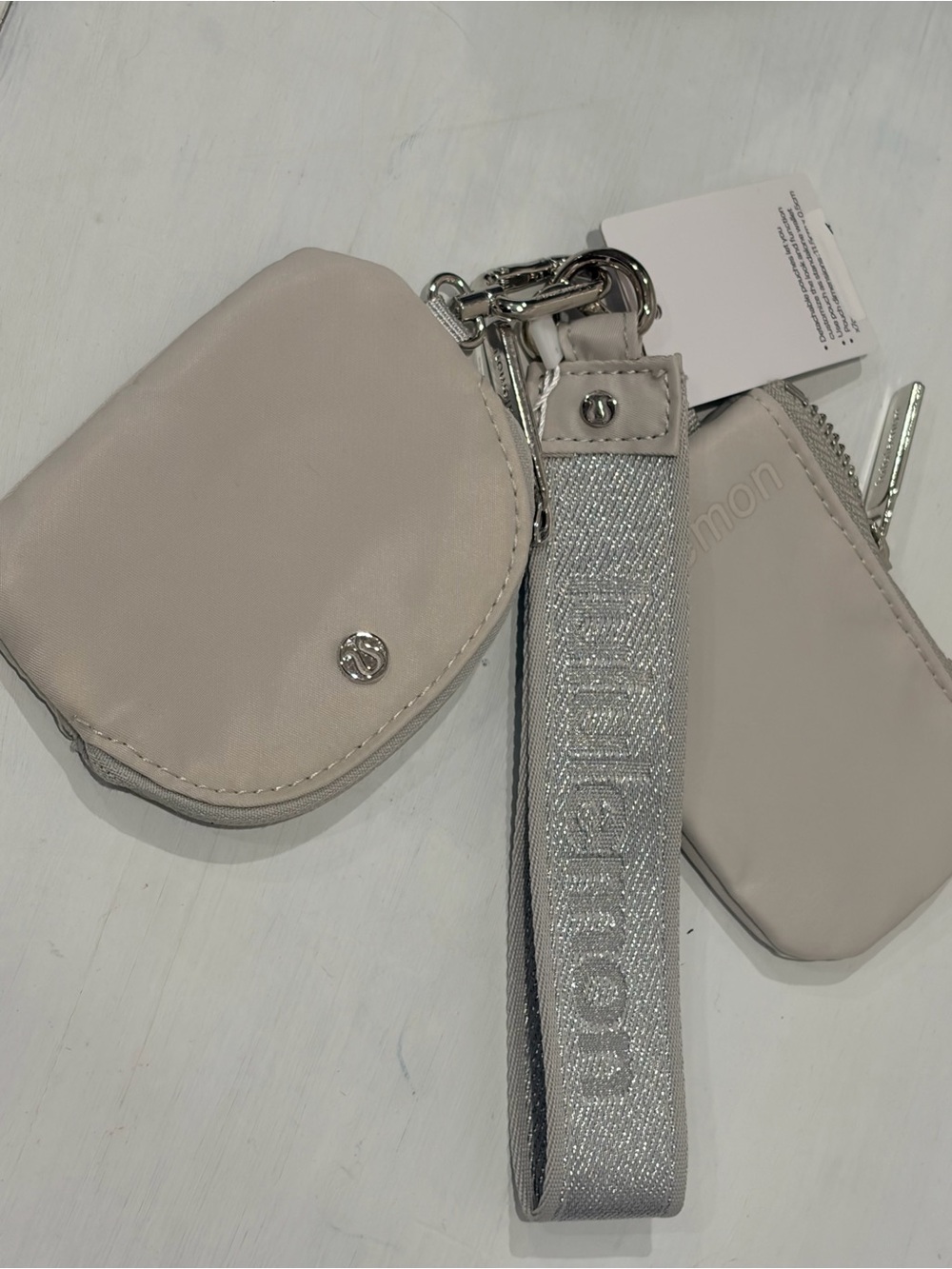 Greyish Beige Lululemon Dual-Pouch Wristlet Keychain with Silver Glitter Strap